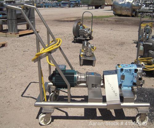 Used Waukesha Rotary Positive Displacement Pump, Model 030, 316 Stainless Steel. Approximately 36 gallons per minute at 100 psi at 600 rpm capacity, (.06) gallon displacement per revolution. 1 1/2" t...