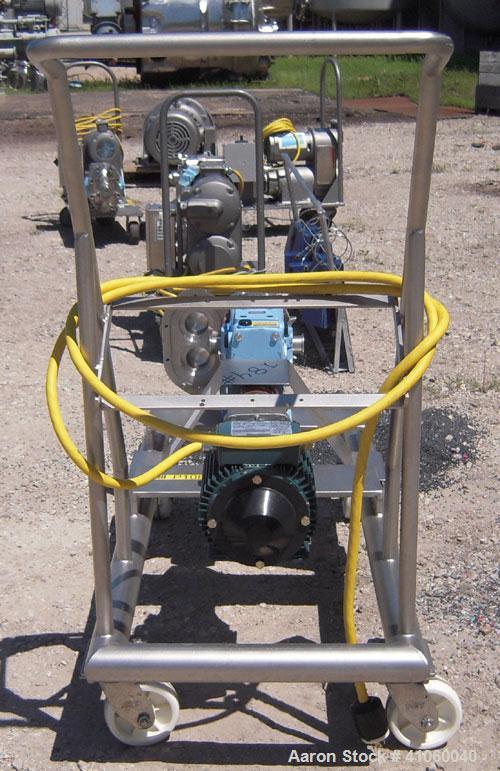 Used Waukesha Rotary Positive Displacement Pump, Model 030, 316 Stainless Steel. Approximately 36 gallons per minute at 100 psi at 600 rpm capacity, (.06) gallon displacement per revolution. 1 1/2" t...