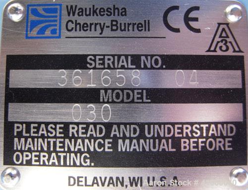 Used Waukesha Rotary Positive Displacement Pump, Model 030, 316 Stainless Steel. Approximately 36 gallons per minute at 100 psi at 600 rpm capacity, (.06) gallon displacement per revolution. 1 1/2" t...