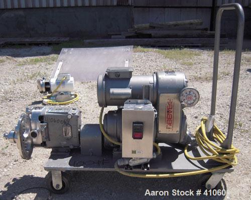 Used Waukesha Rotary Positive Displacement Pump, Model 030, 316 Stainless Steel. Approximately 36 gallons per minute at 100 psi at 600 rpm capacity, .06 gallon displacement per revolution. 1 1/2" tri...