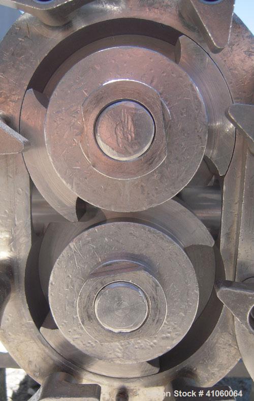 Used Waukesha Rotary Positive Displacement Pump, Model 030, 316 Stainless Steel. Approximately 36 gallons per minute at 100 psi at 600 rpm capacity, .06 gallon displacement per revolution. 1 1/2" tri...