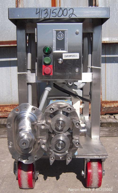 Used Waukesha Rotary Positive Displacement Pump, model 030, 316 stainless steel. Approximately 36 gallons per minute at 100 psi at 600 rpm capacity, .06 gallon displacement per revolution. 1 1/2" tri...