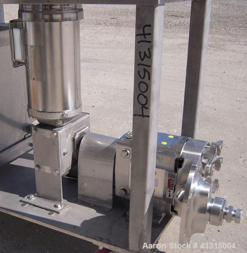 Used Waukesha Rotary Positive Displacement Pump, Model 030, 316 Stainless Steel. Approximately 36 gallons per minute at 100 psi at 600 rpm capacity, .06 gallon displacement per revolution. Stainless ...