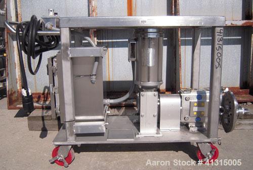 Used Waukesha Rotary Positive Displacement Pump, Model 030, 316 Stainless Steel. Approximately 36 gallons per minute at 100 psi at 600 rpm capacity, .06 gallon displacement per revolution. Stainless ...