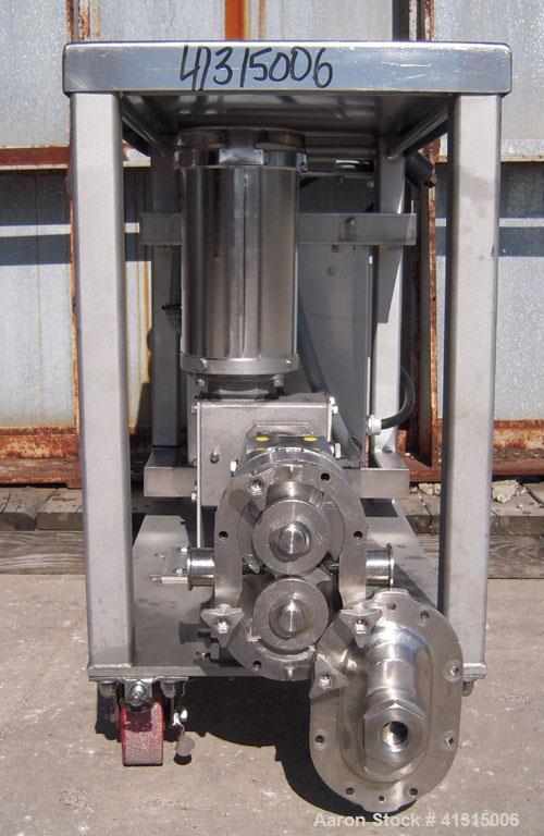 Used Waukesha Rotary Positive Displacement Pump, Model 030, 316 Stainless Steel. Approximately 36 gallons per minute at 100 psi at 600 rpm capacity, .06 gallon displacement per revolution. Stainless ...