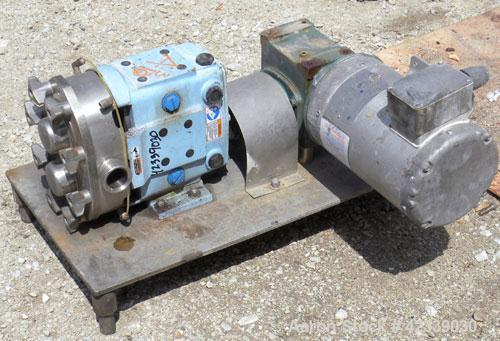 Used Waukesha Rotary Positive Displacement Pump, Model 030, 316 Stainless Steel. Approximately 36 gallons per minute at 100 psi at 600 rpm capacity, .06 gallon displacement per revolution. 2" Threade...
