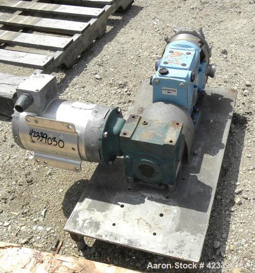 Used Waukesha Rotary Positive Displacement Pump, Model 030, 316 Stainless Steel. Approximately 36 gallons per minute at 100 psi at 600 rpm capacity, .06 gallon displacement per revolution. 2" Threade...