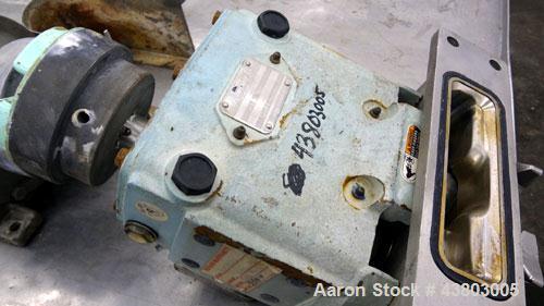 Used Waukesha Rectangular Flange Universal Rotary Positive Displacement Pump, Model 034, 316 Stainless Steel. Approximately 24 gallons per minute at 200 psi at 400 rpm, 0.060 gallon displacement per ...