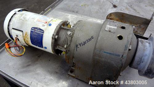 Used Waukesha Rectangular Flange Universal Rotary Positive Displacement Pump, Model 034, 316 Stainless Steel. Approximately 24 gallons per minute at 200 psi at 400 rpm, 0.060 gallon displacement per ...