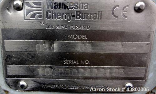 Used Waukesha Rectangular Flange Universal Rotary Positive Displacement Pump, Model 034, 316 Stainless Steel. Approximately 24 gallons per minute at 200 psi at 400 rpm, 0.060 gallon displacement per ...