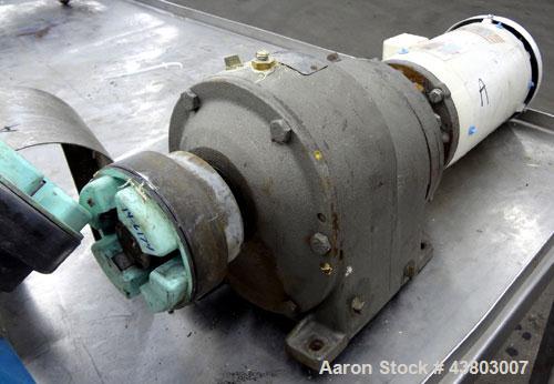 Used- Stainless Steel Waukesha Rectangular Flange Universal Rotary Positive Displacement Pump, Model 034