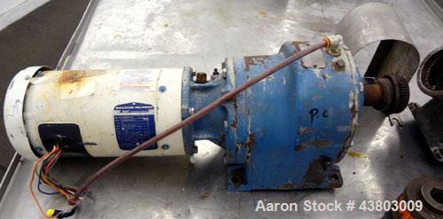 Used Waukesha Rectangular Flange Universal Rotary Positive Displacement Pump, Model 034, 316 Stainless Steel. Approximately 24 gallons per minute at 200 psi at 400 rpm, 0.060 gallon displacement per ...