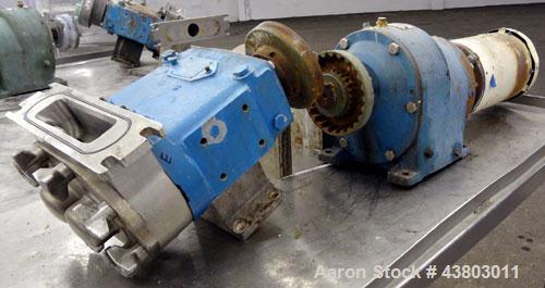Used Waukesha Rectangular Flange Universal Rotary Positive Displacement Pump, Model 034, 316 Stainless Steel. Approximately 24 gallons per minute at 200 psi at 400 rpm, 0.060 gallon displacement per ...