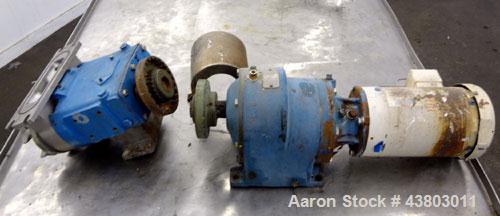 Used Waukesha Rectangular Flange Universal Rotary Positive Displacement Pump, Model 034, 316 Stainless Steel. Approximately 24 gallons per minute at 200 psi at 400 rpm, 0.060 gallon displacement per ...