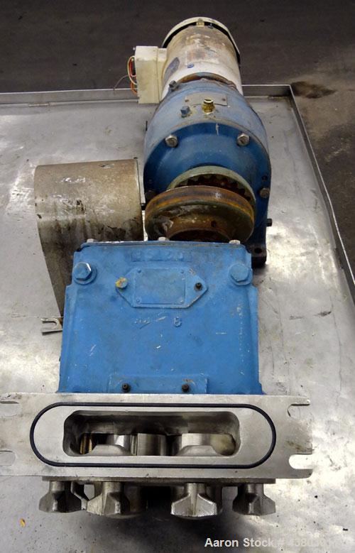 Used Waukesha Rectangular Flange Universal Rotary Positive Displacement Pump, Model 034, 316 Stainless Steel. Approximately 24 gallons per minute at 200 psi at 400 rpm, 0.060 gallon displacement per ...