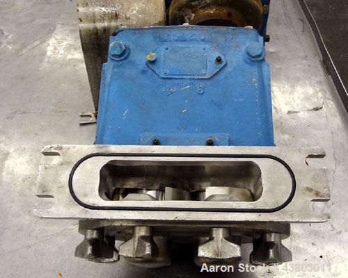 Used Waukesha Rectangular Flange Universal Rotary Positive Displacement Pump, Model 034, 316 Stainless Steel. Approximately 24 gallons per minute at 200 psi at 400 rpm, 0.060 gallon displacement per ...