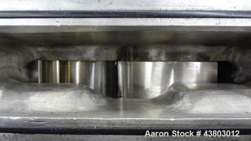 Used Waukesha Rectangular Flange Universal Rotary Positive Displacement Pump, Model 034, 316 Stainless Steel. Approximately 24 gallons per minute at 200 psi at 400 rpm, 0.060 gallon displacement per ...