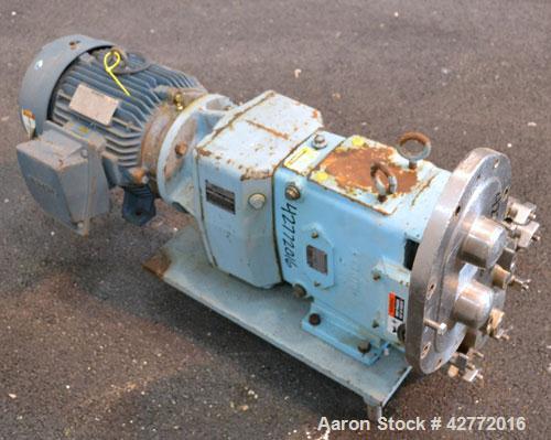 Used Waukesha Rotary Positive Displacement Pump, Model 060, 316 Stainless Steel. Approximately 90 gallons per minute at 200 psi at 600 rpm. (.153) gallons displacement per revolution. 2-1/2" Tri-clam...