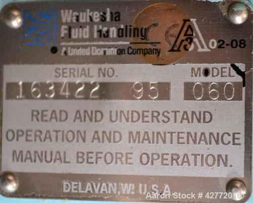 Used Waukesha Rotary Positive Displacement Pump, Model 060, 316 Stainless Steel. Approximately 90 gallons per minute at 200 psi at 600 rpm. (.153) gallons displacement per revolution. 2-1/2" Tri-clam...