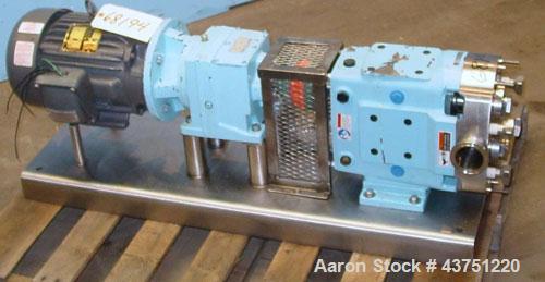 Used Waukesha Universal Rotary Positive Displacement Pump, Model 060, 316 Stainless Steel. Approximately 90 gallons per minute at 200 psi at 600 rpm. 0.153 gallons displacement per revolution. 2-1/2"...