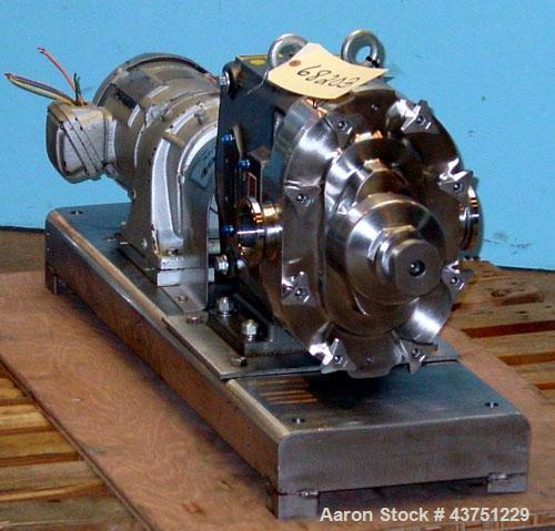 Used Waukesha Universal Rotary Positive Displacement Pump, Model 060, 316 Stainless Steel. Approximately 90 gallons per minute at 200 psi at 600 rpm. 0.153 gallons displacement per revolution. 2-1/2"...