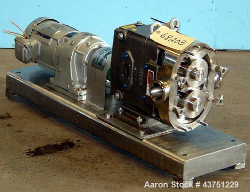 Used Waukesha Universal Rotary Positive Displacement Pump, Model 060, 316 Stainless Steel. Approximately 90 gallons per minute at 200 psi at 600 rpm. 0.153 gallons displacement per revolution. 2-1/2"...