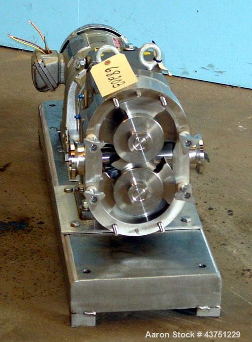 Used Waukesha Universal Rotary Positive Displacement Pump, Model 060, 316 Stainless Steel. Approximately 90 gallons per minute at 200 psi at 600 rpm. 0.153 gallons displacement per revolution. 2-1/2"...