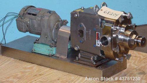 Used Waukesha Universal Rotary Positive Displacement Pump, Model 060, 316 Stainless Steel. Approximately 90 gallons per minute at 200 psi at 600 rpm. 0.153 gallons displacement per revolution. 2-1/2"...
