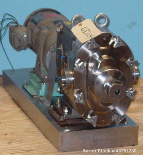 Used Waukesha Universal Rotary Positive Displacement Pump, Model 060, 316 Stainless Steel. Approximately 90 gallons per minute at 200 psi at 600 rpm. 0.153 gallons displacement per revolution. 2-1/2"...