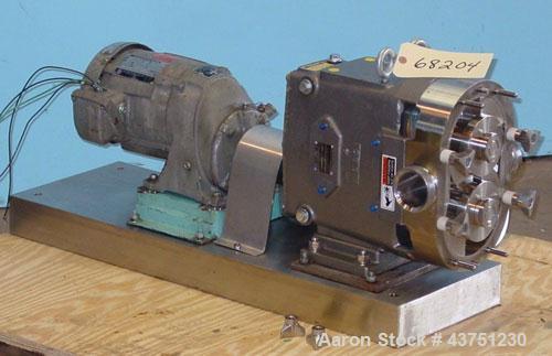 Used Waukesha Universal Rotary Positive Displacement Pump, Model 060, 316 Stainless Steel. Approximately 90 gallons per minute at 200 psi at 600 rpm. 0.153 gallons displacement per revolution. 2-1/2"...