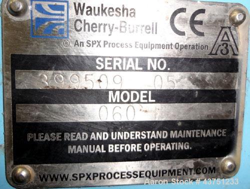 Used Waukesha Universal Rotary Positive Displacement Pump, Model 060, 316 Stainless Steel. Approximately 90 gallons per minute at 200 psi at 600 rpm. (0.153) gallons displacement per revolution. 2-1/...