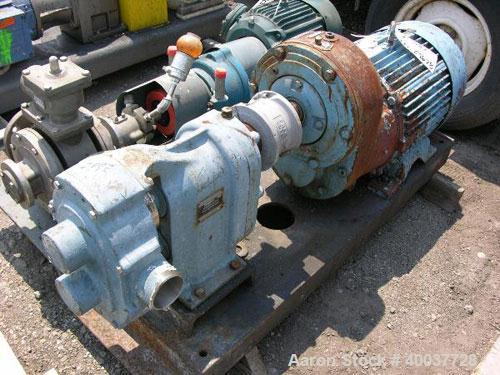 Used Waukesha Rotary Lobe Pump, Model 125, stainless steel construction, 2.5" inlet/outlet, rated up to 100 gpm, on base with 15 hp, 230/460 volt XP motor, serial #T3350SS.