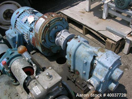 Used Waukesha Rotary Lobe Pump, Model 125, stainless steel construction, 2.5" inlet/outlet, rated up to 100 gpm, on base with 15 hp, 230/460 volt XP motor, serial #T3350SS.