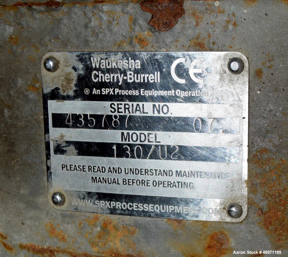 Used Waukesha Positive Displacement Pump, Model 130/U2, 316 Stainless Steel. Approximate displacement 0.254 gallons per revolution, nominal capacity to 150 gallons per minute. Driven by a 5hp, 3/60/2...