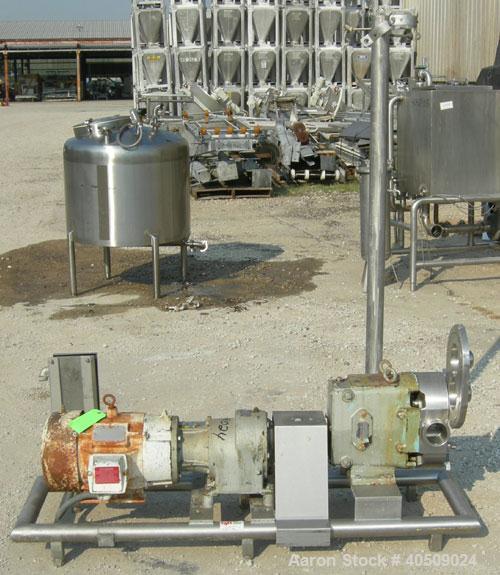Used Waukesha Universal Rotary Positive Displacement Pump, Model 130, 316 stainless steel. Approximately 130 gallons per minute at 100 psi at 600 rpm capacity. 3" tri-clamp inlet/outlet. Driven by a ...