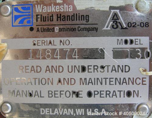 Used Waukesha Universal Rotary Positive Displacement Pump, Model 130, 316 stainless steel. Approximately 130 gallons per minute at 100 psi at 600 rpm capacity. 3" tri-clamp inlet/outlet. Driven by a ...