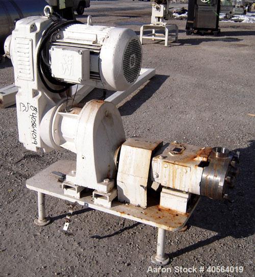 Used Waukesha Horizontal Universal Rotary Positive Displacement Pump, model 130, 316 stainless steel. Approximately 130 gallons per minute at 100 psi at 600 rpm capacity. 3" tri-clamp inlet/outlet. (...