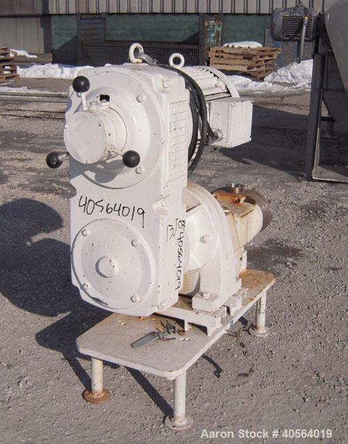 Used Waukesha Horizontal Universal Rotary Positive Displacement Pump, model 130, 316 stainless steel. Approximately 130 gallons per minute at 100 psi at 600 rpm capacity. 3" tri-clamp inlet/outlet. (...