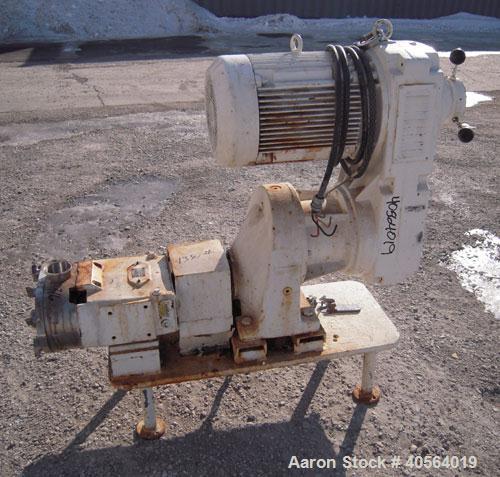 Used Waukesha Horizontal Universal Rotary Positive Displacement Pump, model 130, 316 stainless steel. Approximately 130 gallons per minute at 100 psi at 600 rpm capacity. 3" tri-clamp inlet/outlet. (...