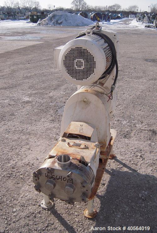 Used Waukesha Horizontal Universal Rotary Positive Displacement Pump, model 130, 316 stainless steel. Approximately 130 gallons per minute at 100 psi at 600 rpm capacity. 3" tri-clamp inlet/outlet. (...