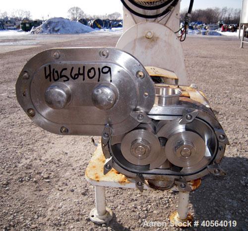 Used Waukesha Horizontal Universal Rotary Positive Displacement Pump, model 130, 316 stainless steel. Approximately 130 gallons per minute at 100 psi at 600 rpm capacity. 3" tri-clamp inlet/outlet. (...