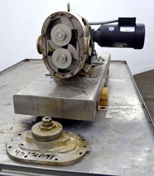 Used Waukesha Universal Rotary Positive Displacement Pump, Model 130, 316 Stainless Steel. Approximately 130 gallons per minute at 100 psi at 600 rpm capacity, 0.254 gallon displacement per revolutio...
