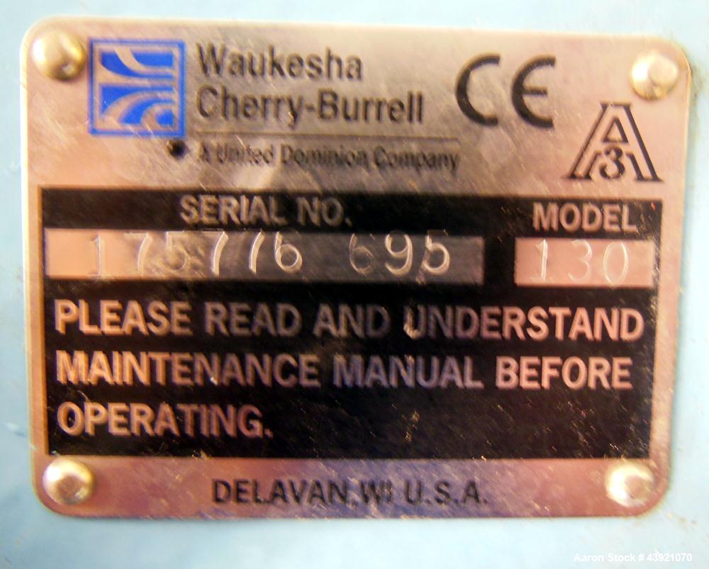 Used Waukesha Universal Rotary Positive Displacement Pump, Model 130, 316 Stainless Steel. Approximately 130 gallons per minute at 100 psi at 600 rpm capacity, (0.254) gallon displacement per revolut...