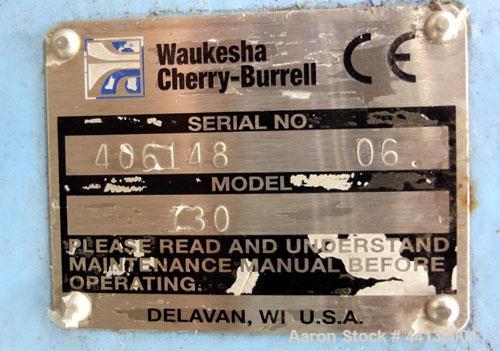 Used Waukesha Universal Rotary Positive Displacement Pump, Model 130, 316 Stainless Steel. Approximately 130 gallons per minute at 100 psi at 600 rpm capacity, 0.254 gallon displacement per revolutio...