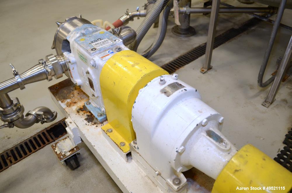 Used Waukesha Positive Displacement Pump, Model 130, Serial # 3768-18R105. Stainless Steel Construction. Mounted on Cart with Casters.