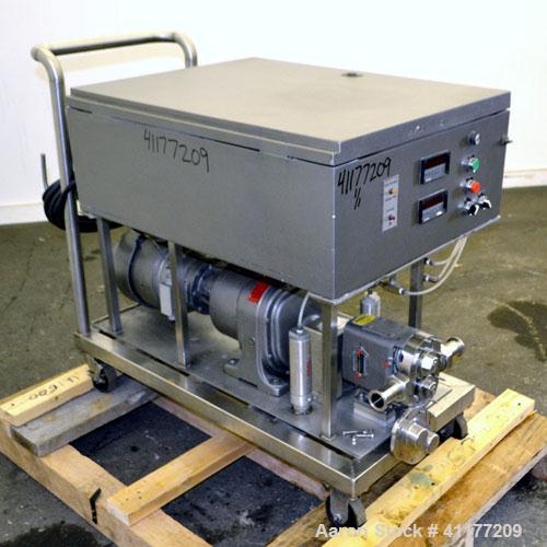 Used Waukesha Rotary Positive Displacement Pump, Model 15, 316 Stainless Steel. Approximately 9 gallons per minute at 200 psi at 700 rpm capacity, (.014) gallon displacement per revolution. 1-1/2" th...