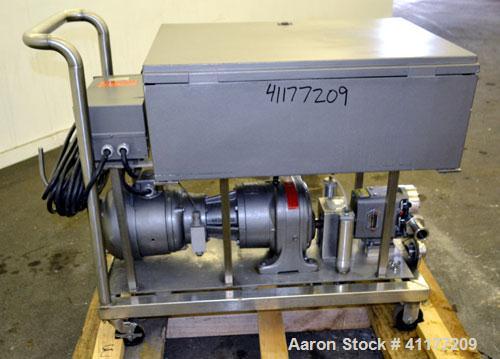Used Waukesha Rotary Positive Displacement Pump, Model 15, 316 Stainless Steel. Approximately 9 gallons per minute at 200 psi at 700 rpm capacity, (.014) gallon displacement per revolution. 1-1/2" th...