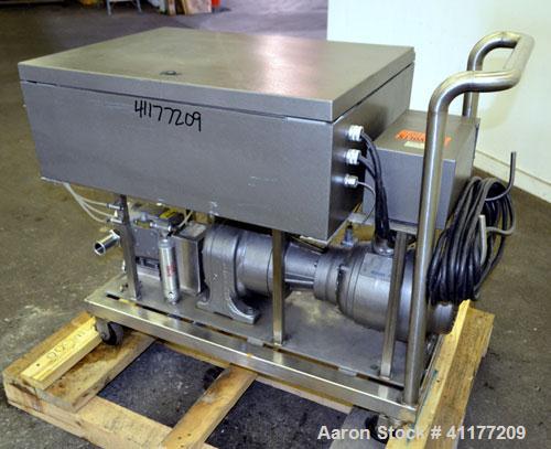 Used Waukesha Rotary Positive Displacement Pump, Model 15, 316 Stainless Steel. Approximately 9 gallons per minute at 200 psi at 700 rpm capacity, (.014) gallon displacement per revolution. 1-1/2" th...