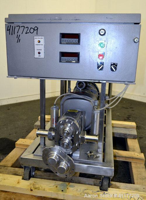 Used Waukesha Rotary Positive Displacement Pump, Model 15, 316 Stainless Steel. Approximately 9 gallons per minute at 200 psi at 700 rpm capacity, (.014) gallon displacement per revolution. 1-1/2" th...