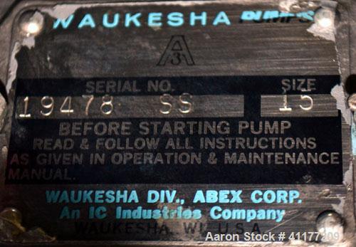 Used Waukesha Rotary Positive Displacement Pump, Model 15, 316 Stainless Steel. Approximately 9 gallons per minute at 200 psi at 700 rpm capacity, (.014) gallon displacement per revolution. 1-1/2" th...